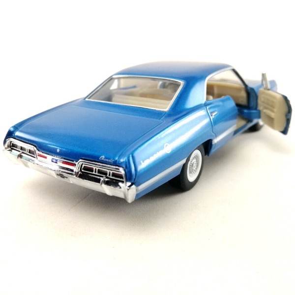 Машинка металлическая Kinsmart 1:43 1967 Chevrolet Impala (цвет голубой) KT5418W