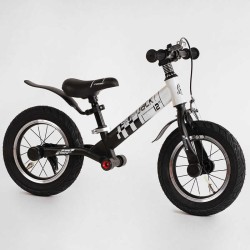 Велобіг Corso "Skip Jack" 11057 ЧОРНО-БІЛИЙ, надувні колеса 12", сталева рама з амортизатором, ручне гальмо, підніжка, в коробці
